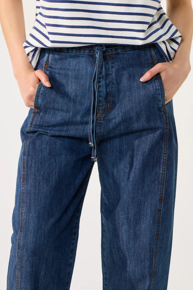 Pantalón de tiro alto en denim azul con pierna amplia y cintura ajustable de Cuesta Blanca en Pantalones para argentina