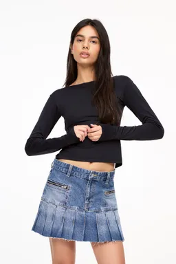 Minifalda denim plisada de Pull&Bear en Faldas para argentina