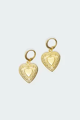 Aros corazón relicario de Edikted en Bijouterie para argentina
