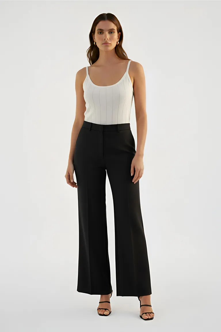 Pantalón negro recto con efecto tornasol y bolsillos laterales de Naíma en Pantalones para argentina