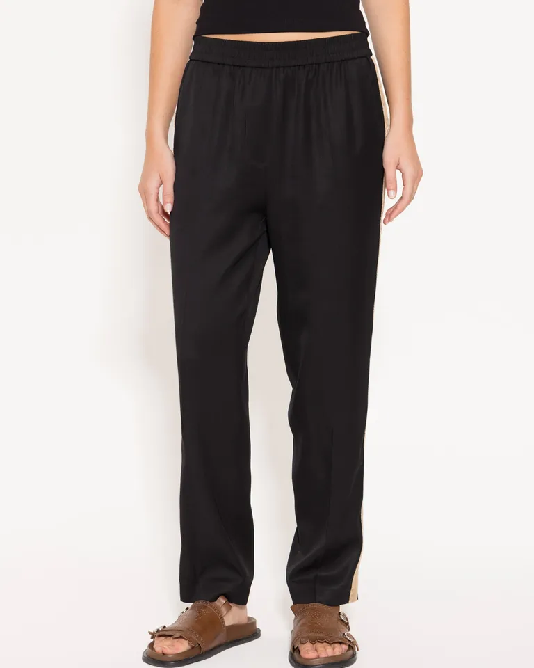 Pantalón Negro Cómodo y Versátil con Bolsillos Laterales de Jazmin Chebar en Pantalones para argentina