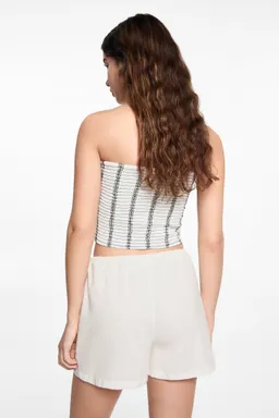 Top strapless estampado de Mango Teen en Tops para argentina