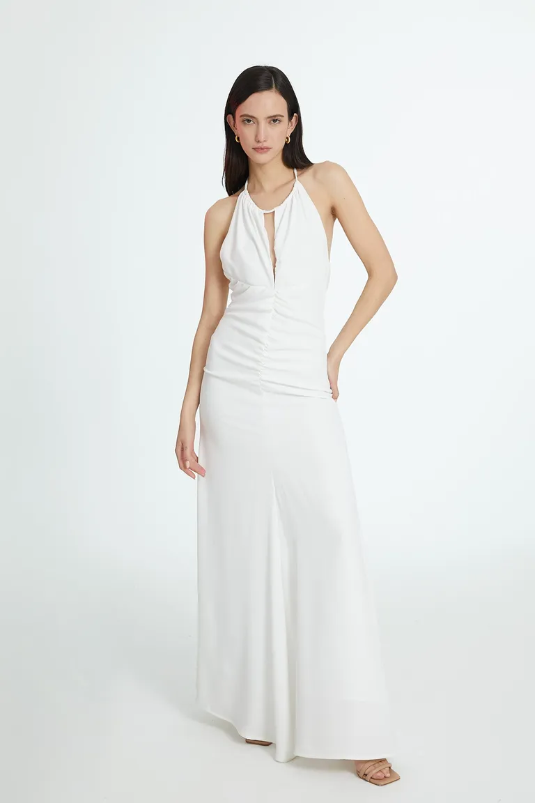 Vestido blanco elegante y minimalista para mujer, perfecto para ocasiones especiales de Naíma en Vestidos para argentina