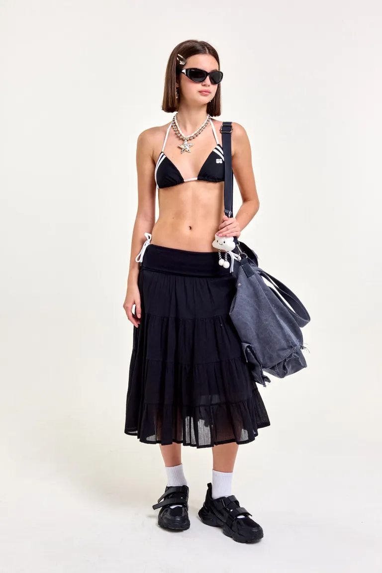 Falda midi negra con volados, diseño suelto y fluido para un estilo veraniego de 47 Street en Faldas para argentina