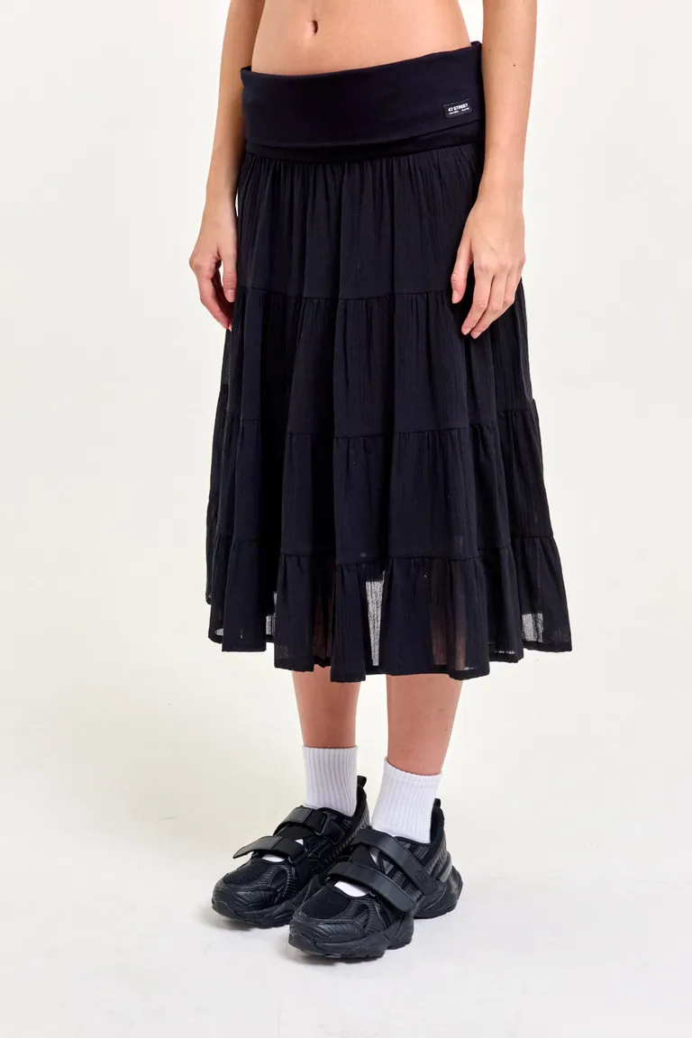 Falda midi negra con volados, diseño suelto y fluido para un estilo veraniego de 47 Street en Faldas para argentina