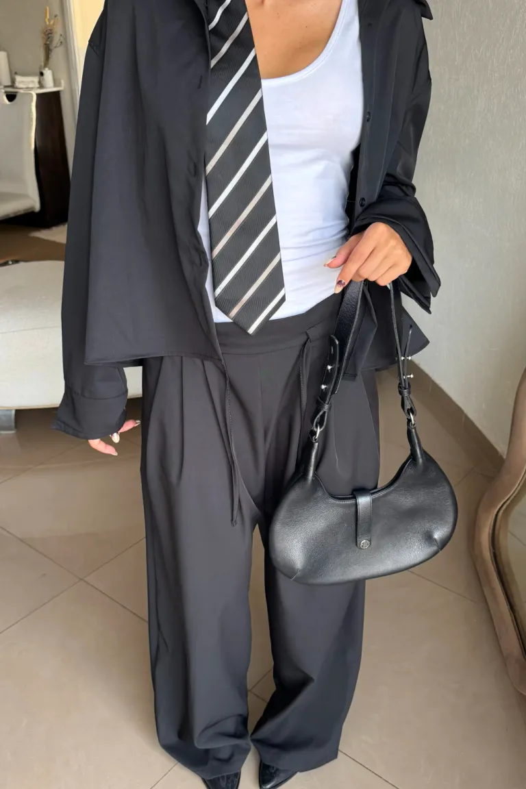 Pantalón de seda con pinzas tableadas y lazo en la cintura para mujer de Belle en Pantalones para argentina