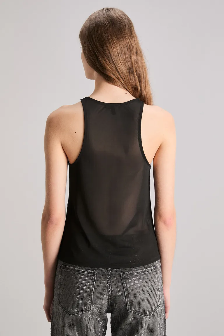 Top negro de tul con diseño exclusivo de nuestra colección de Kosiuko en Tops para argentina