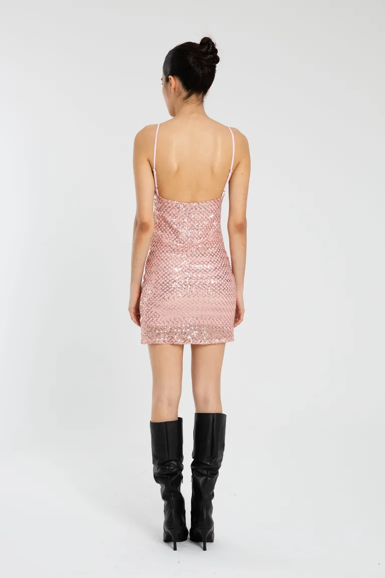 Vestido corto con lentejuelas rosa, de diseño ajustado y modular para una noche especial de Naíma en Vestidos para argentina