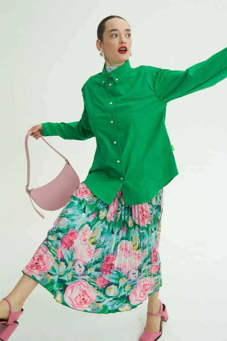 Falda midi plisada con estampados exclusivos y cintura elástica de Las Pepas en Faldas para argentina
