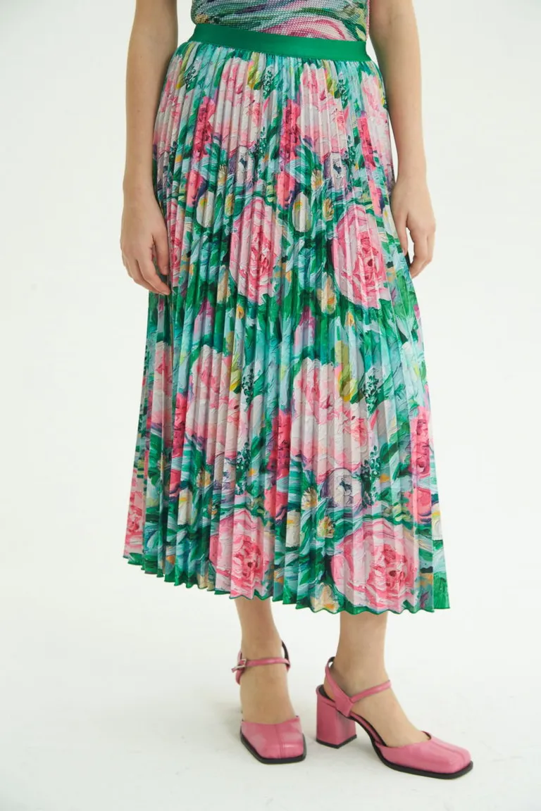Falda midi plisada con estampados exclusivos y cintura elástica de Las Pepas en Faldas para argentina