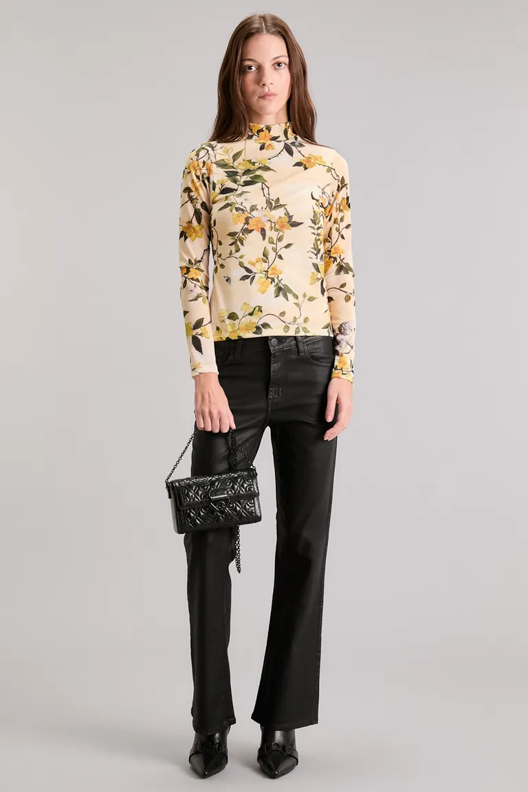 Remera de manga larga con estampa de flores en tonos amarillos y beiges de Kosiuko en Remeras para argentina