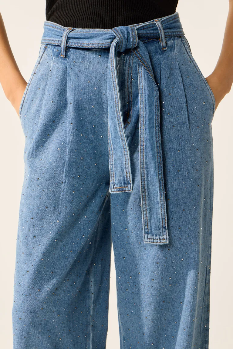 Pantalones de denim de tiro alto y pierna amplia con diseño de hotfix y lazo en la cintura de Cuesta Blanca en Pantalones para argentina