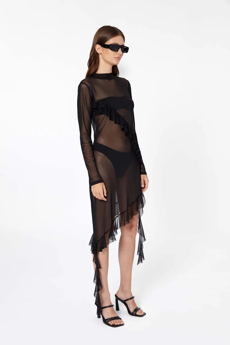 Vestido de microtul negro con diseño asimétrico y volados de Naíma en Vestidos para argentina