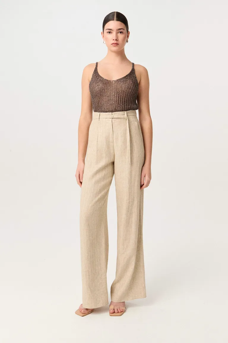 Top tejido metálico con delicados detalles para un look de noche sofisticado de Markova en Tops para argentina