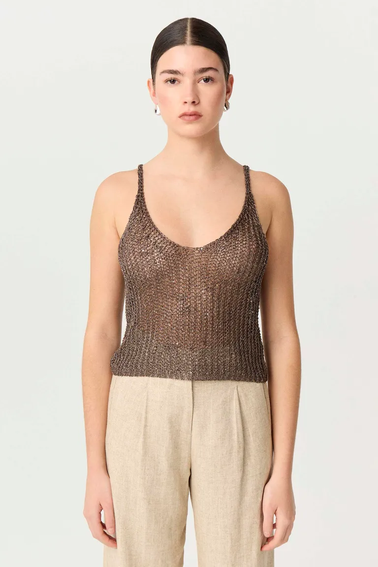 Top tejido metálico con delicados detalles para un look de noche sofisticado de Markova en Tops para argentina