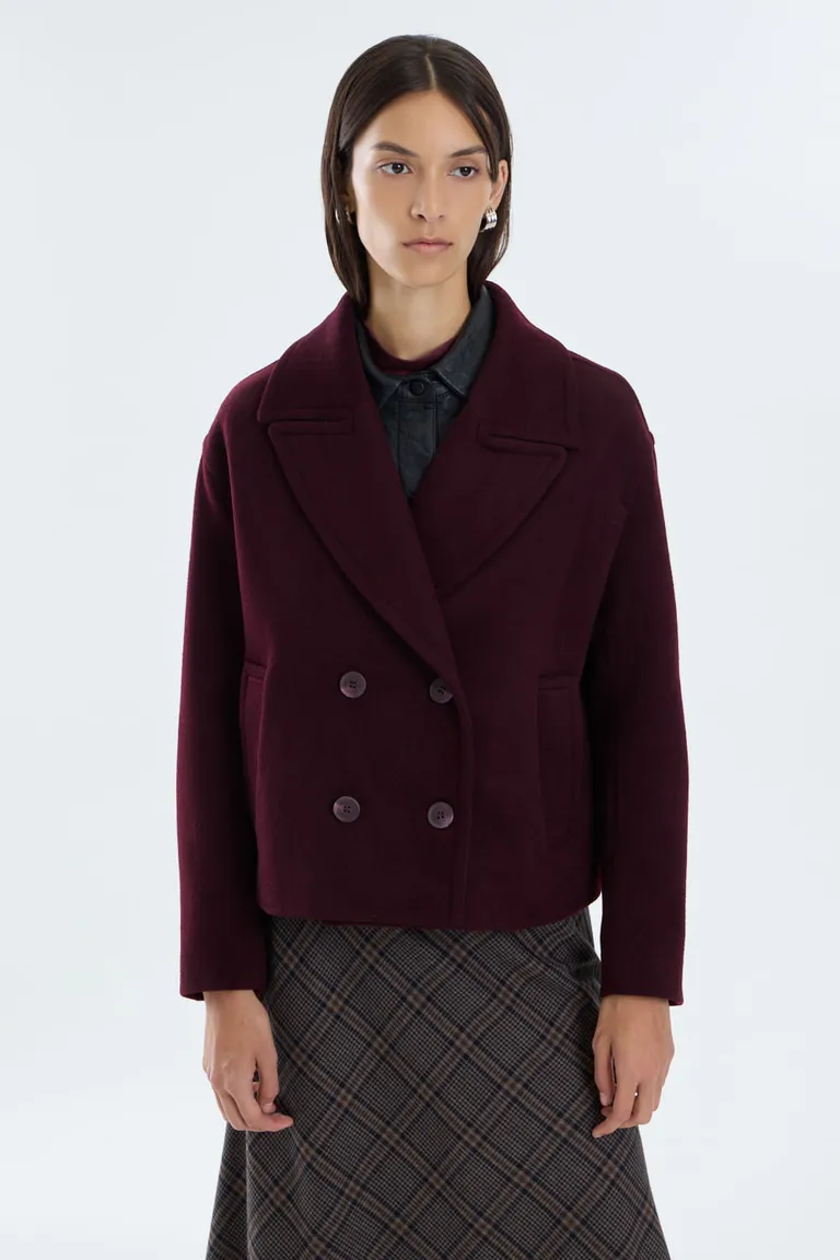 Abrigo corto de paño con doble abotonadura, solapas clásicas y calce holgado de Portsaid en Tapados para argentina