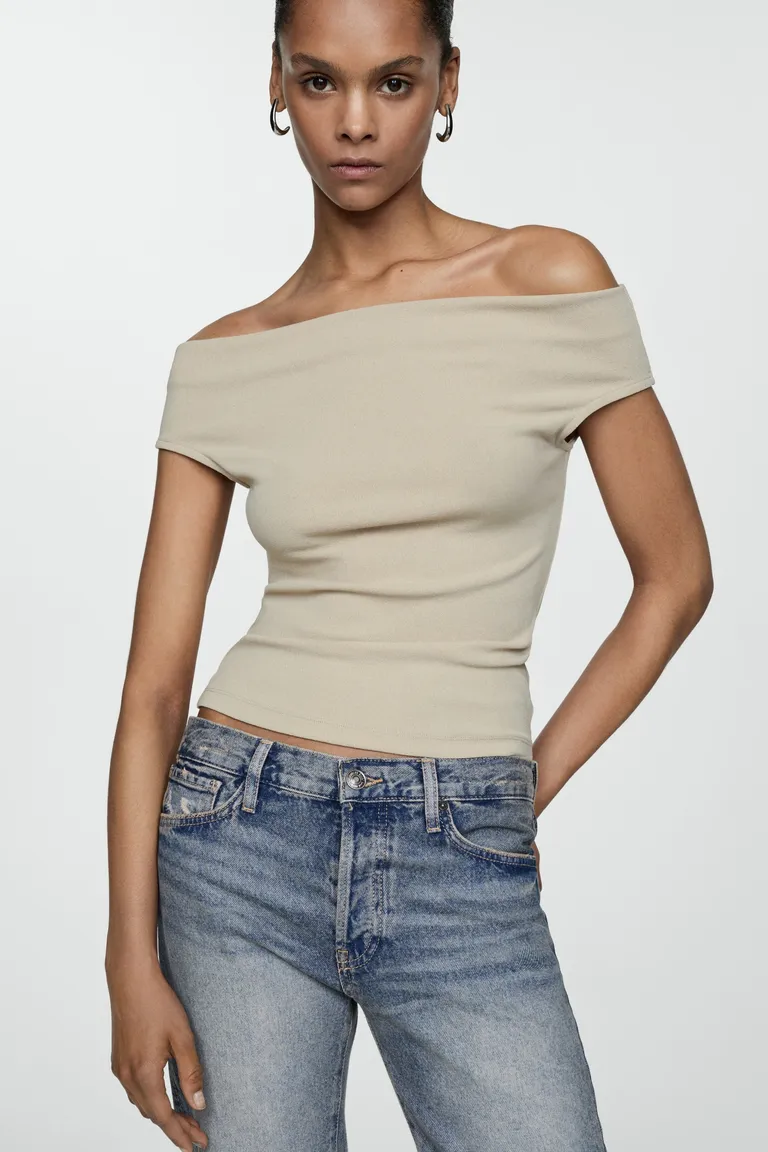 Jeans girlfriend tiro bajo rotos de Mango en Pantalones para argentina