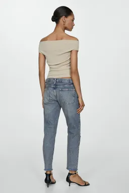 Jeans girlfriend tiro bajo rotos de Mango en Pantalones para argentina