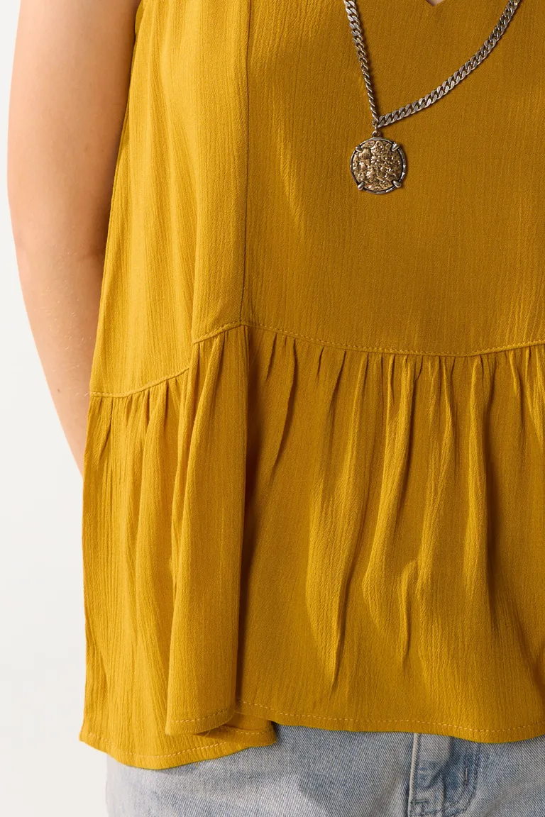 Top con escote en V y diseño fruncido en la cintura de Cuesta Blanca en Tops para argentina