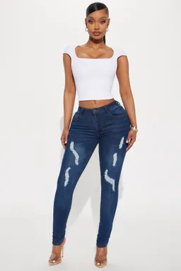 Jeans skinny rotos tiro medio de Fashion Nova en Pantalones para argentina