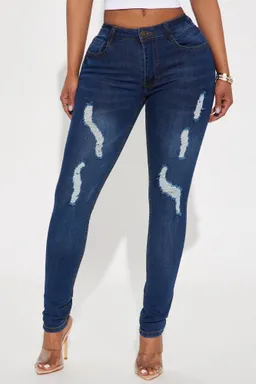 Jeans skinny rotos tiro medio de Fashion Nova en Pantalones para argentina