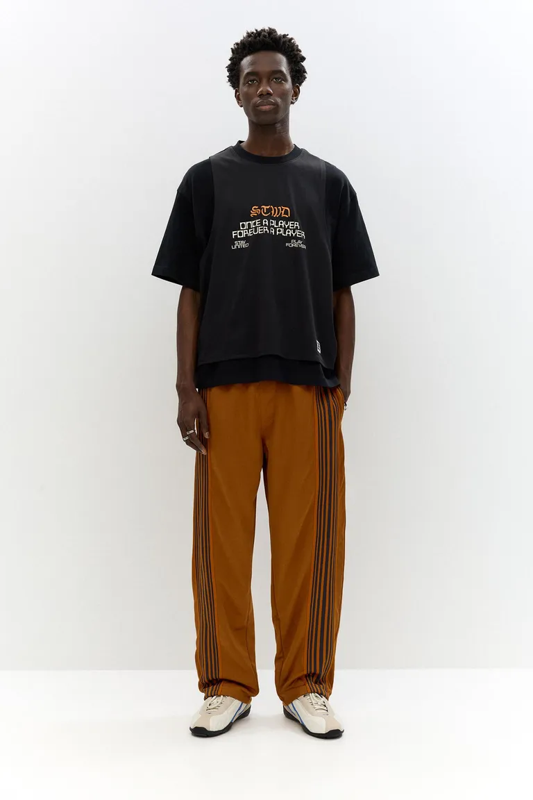 Pantalón chándal rayas laterales de Pull&Bear en Pantalones para argentina