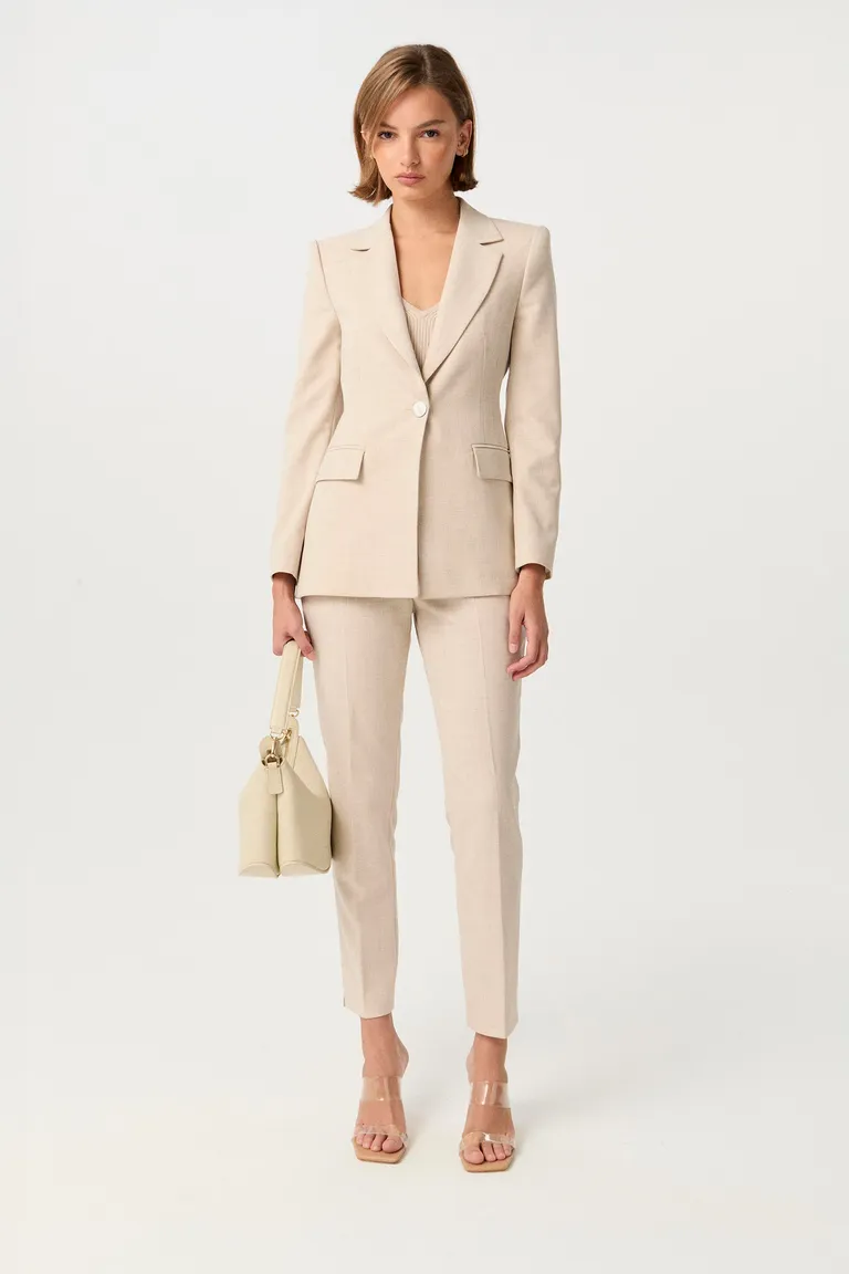 Pantalón de viscosa de corte slim y tiro alto en tonos beige de Markova en Pantalones para argentina