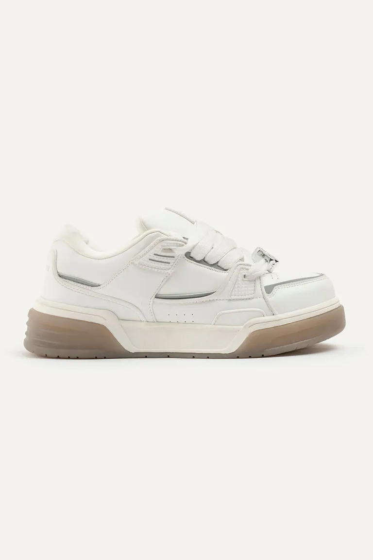 Zapatilla de diseño con recortes de cuero y suela bicolor de 47 Street en Zapatillas para argentina