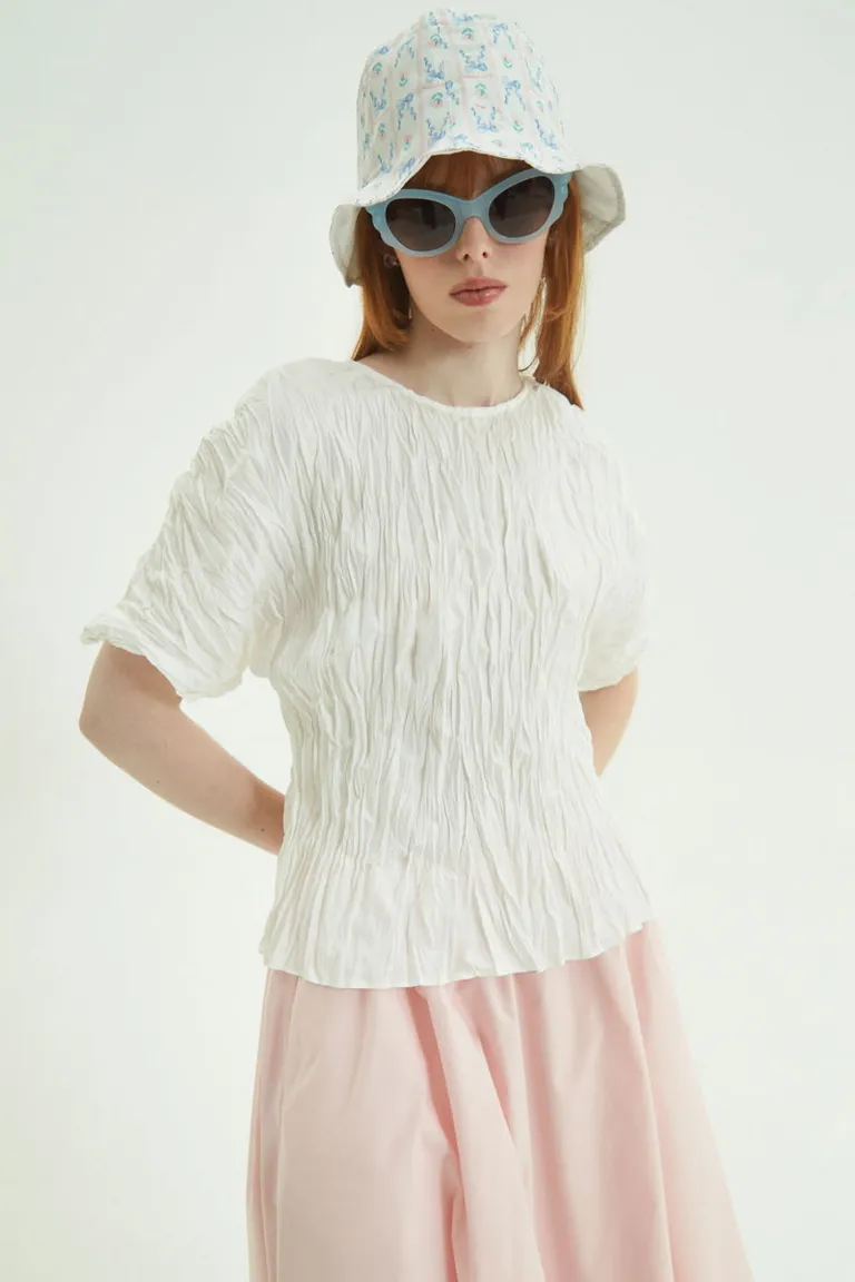 Blusa de manga murciélago con textura arrugada y silueta ceñida en la cintura de Las Pepas en Blusas para argentina
