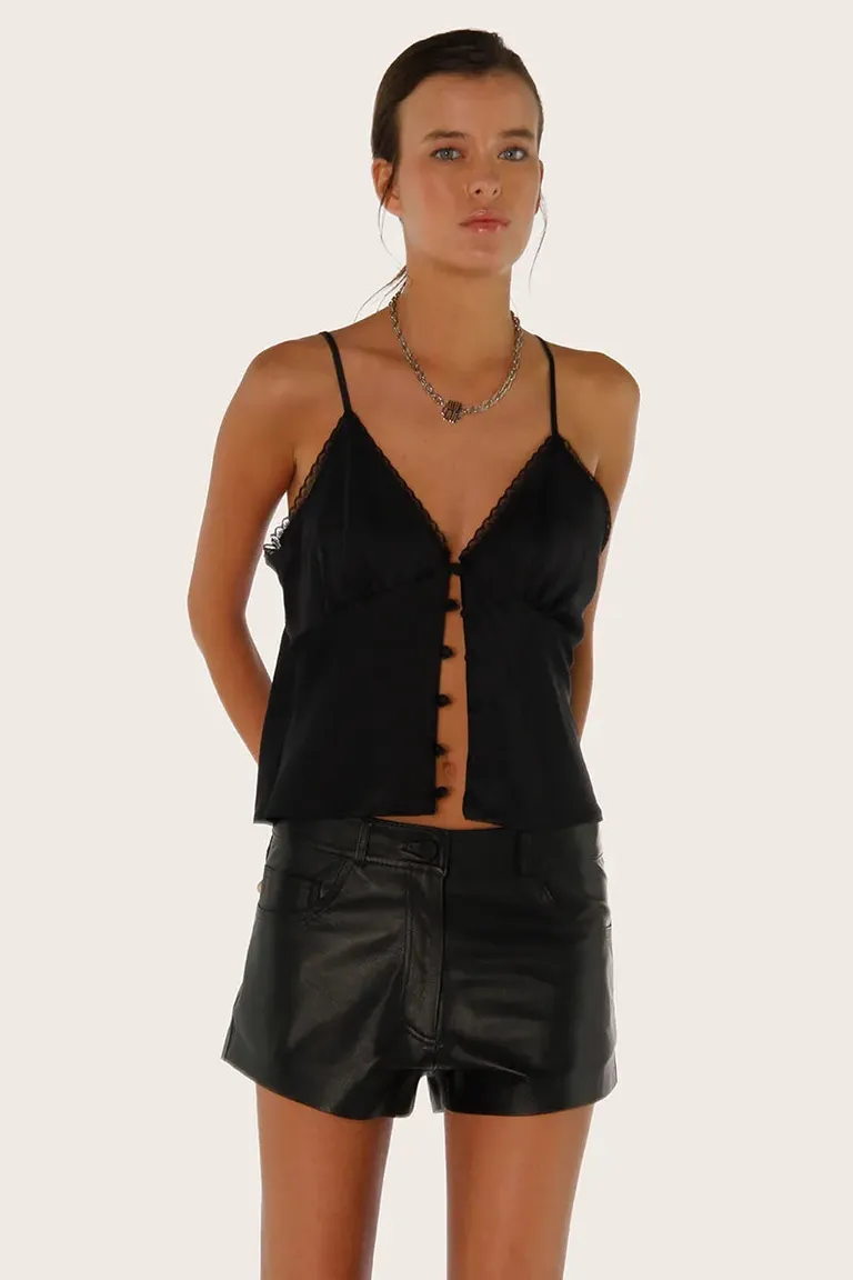 Top negro de cuero con diseño modular y avíos personalizados de Sofia Sarkany en Tops para argentina