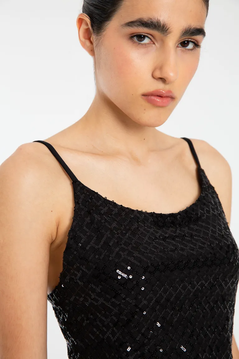 Vestido ajustado de lentejuelas, diseño modular sobre las rodillas de Naíma en Vestidos para argentina