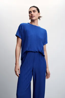 Pantalón wideleg plisado de Mango en Pantalones para argentina