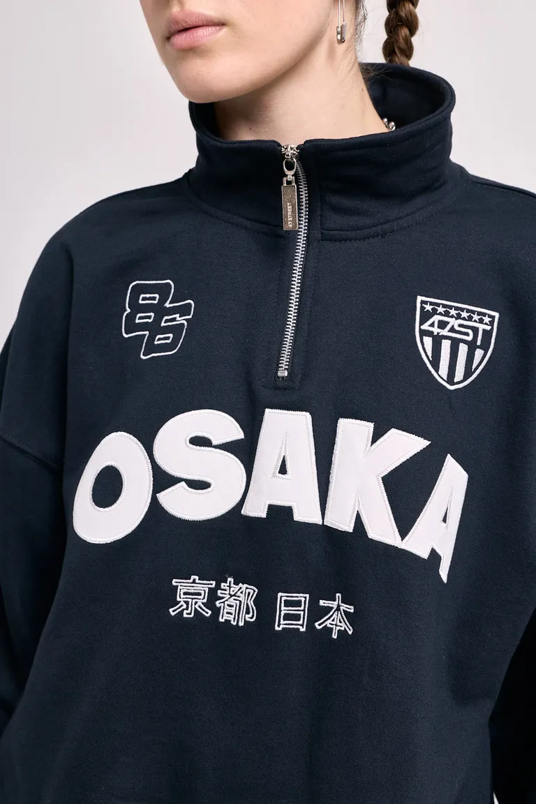 Buzo de cuello alto con medio cierre y estampado gráfico frontal de 47 Street en Buzos y Sweaters para argentina