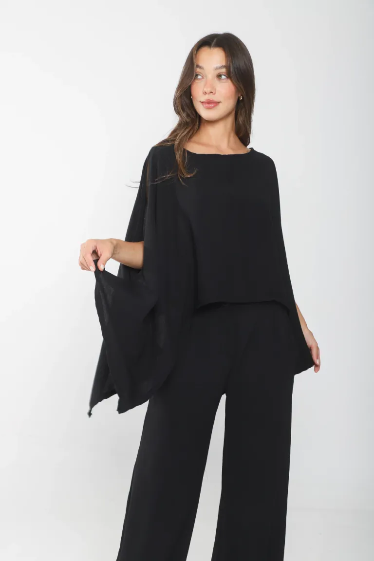 Blusa negra con mangas amplias y hombros descubiertos de Belle en Blusas para argentina