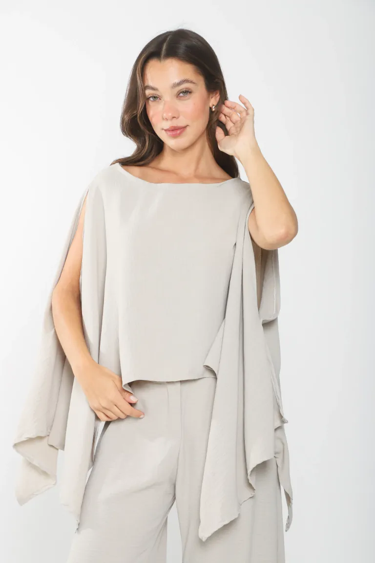 Blusa negra con mangas amplias y hombros descubiertos de Belle en Blusas para argentina