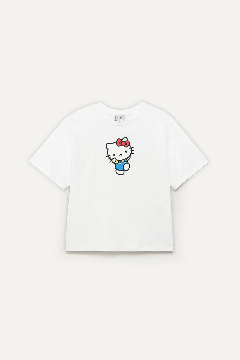 Remera de jersey blanco con estampa de Kitty, ideal para looks relajados de 47 Street en Remeras para argentina
