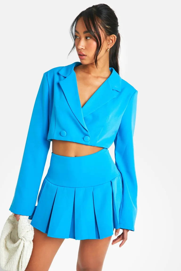 Minifalda plisada con bajo desigual de Boohoo en Faldas para argentina