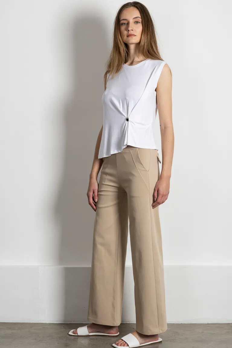 Pantalón de corte amplio y silueta estilizada en tono neutro de Kill en Pantalones para argentina