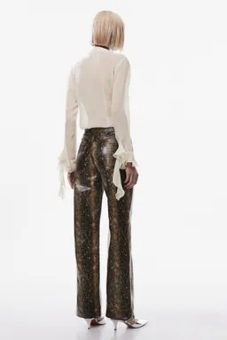 Pantalón estampado serpiente de Mango en Pantalones para argentina