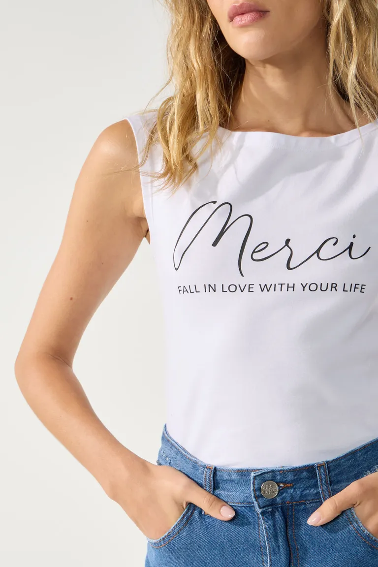 Remera de algodón con estampado gráfico 'Merci' para dama de Cuesta Blanca en Remeras para argentina