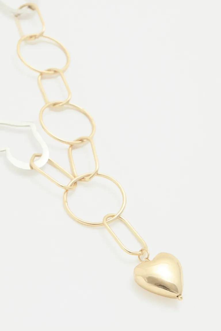 Collar con cadena y dije corazón con detalles múltiples y cadena extensible de Rapsodia en Bijouterie para argentina