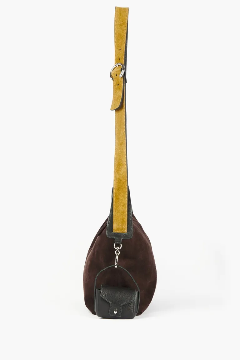 Bandolera grande de diseño estructurado con correa ajustable y cierre metálico para uso cotidiano de Mishka en Bolsos y Carteras para argentina