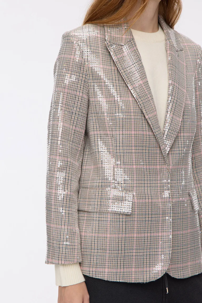 Blazer con diseño cuadrillé y lentejuelas, cuello solapa, cierre frontal y bolsillos laterales con tapa de Cuesta Blanca en Blazers para argentina