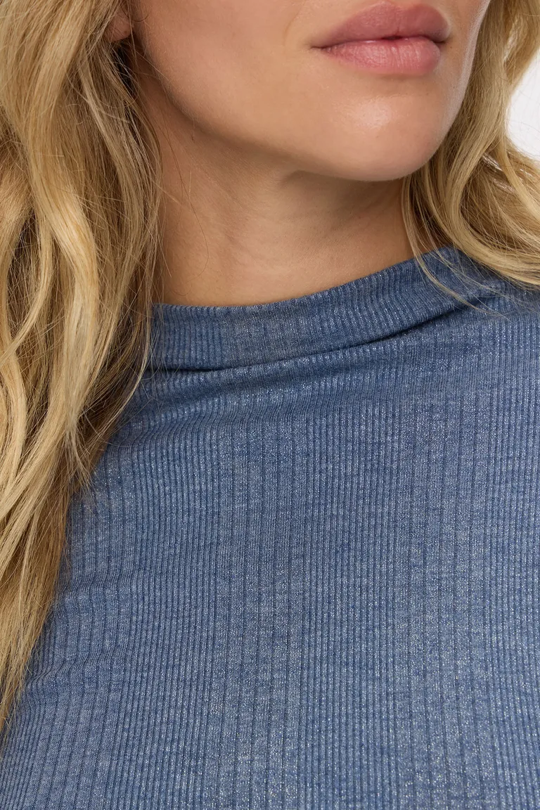 Remera manga larga de morley con cuello medio y ruedo asimétrico de Cuesta Blanca en Remeras para argentina