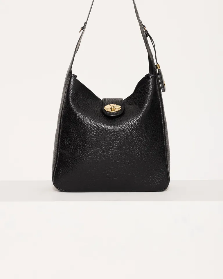 Elegante bolso hobo de cuero vacuno con cierre metálico y compartimento interno de Jazmin Chebar en Bolsos y Carteras para argentina