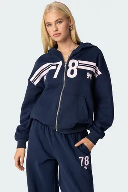 Buzo hoodie moño cierre de Edikted en Buzos y Sweaters para argentina