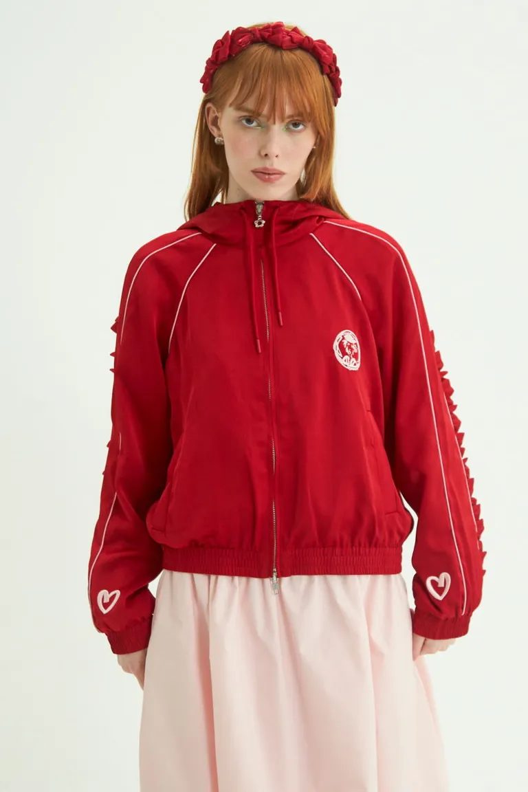 Campera de tela satinada con capucha y bordados exclusivos de diseño fantasy de Las Pepas en Chaquetas para argentina