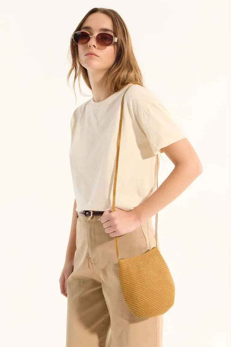 Minicartera ovalada de rafia, estilo casual y práctico para lucir en el verano de Portsaid en Bolsos y Carteras para argentina