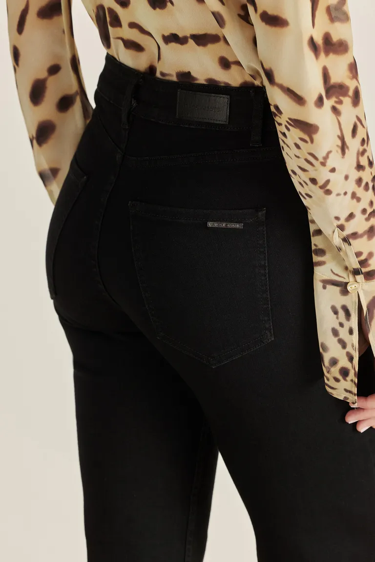 Pantalón de denim con cruce doble en la cintura, corte recto y tiro alto de Tucci en Pantalones para argentina