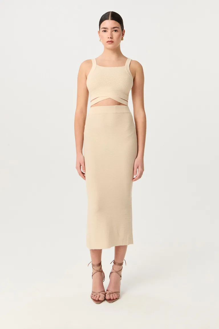 Falda midi de punto tramado con silueta anatómica y calce perfecto de Markova en Faldas para argentina
